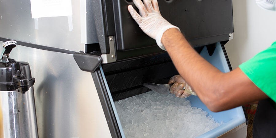 Commercial ice machine in restaurant kitchen