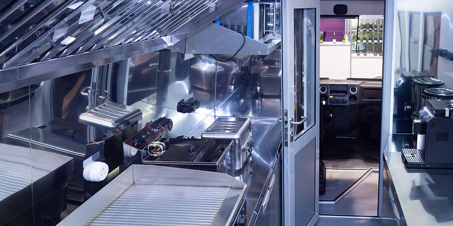 Ghost kitchen food truck with stainless steel appliances